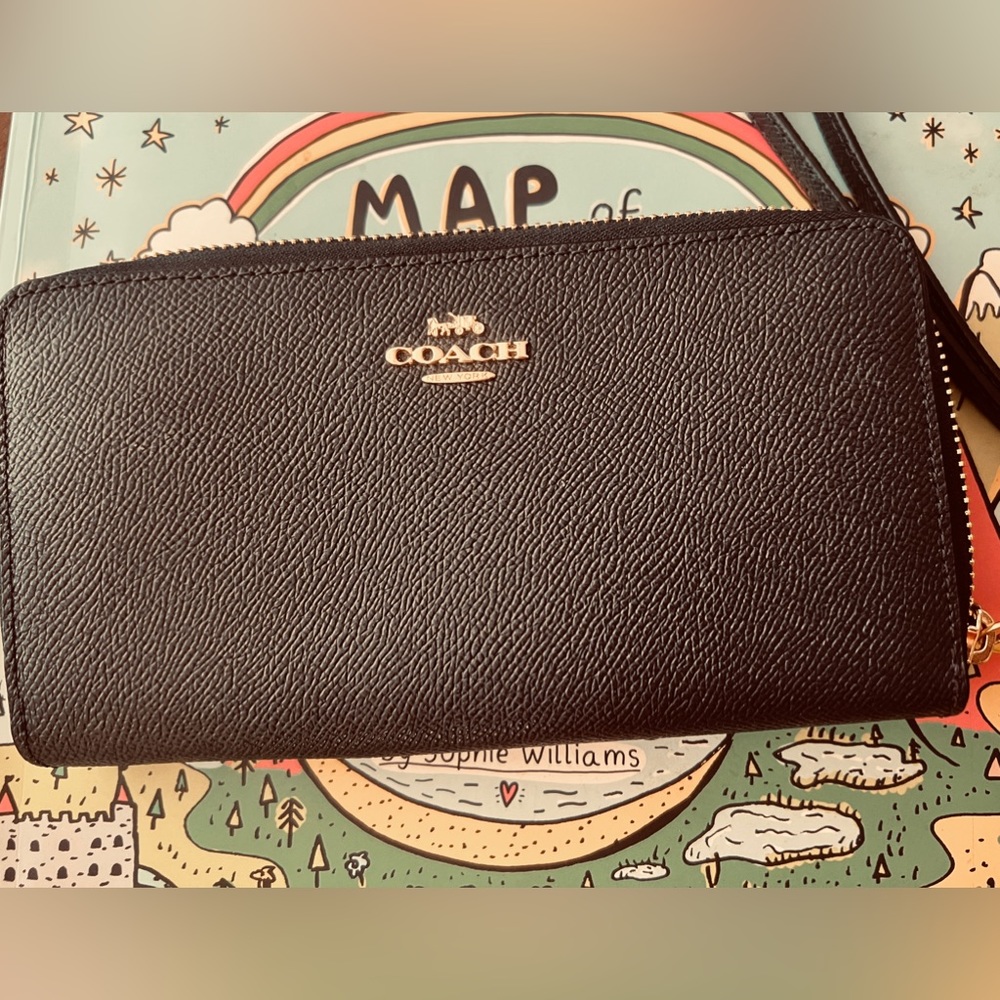 New Coach wallet. New with tags-received as a gift purchased from Coach.